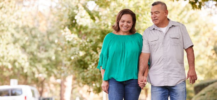 older couple walking together for Quotacy blog tips for boost immune system