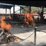 Funeral pyres at the Nigambodh Ghat in New Delhi