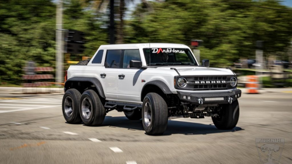 Apocalypse Dark Horse is a Ford Bronco pickup with 6 wheels and a lift kit