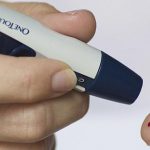 Image of person doing diabetes test of their insulin level for diabetes