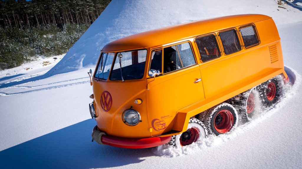 VW restores rare split-window Bus with tank-like tracks