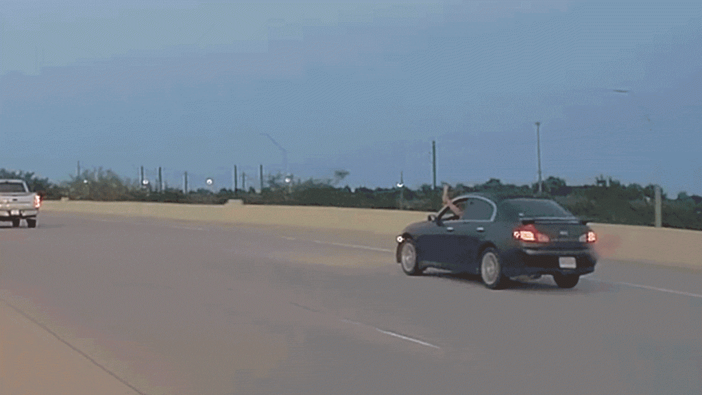 Ax-Wielding Driver Punts Innocent Driver Into a Ditch