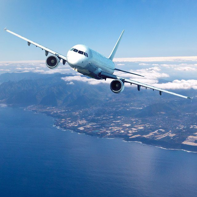 An airplane flying toward the viewer