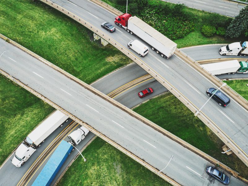 Aerial view of semi-trucks on a highway