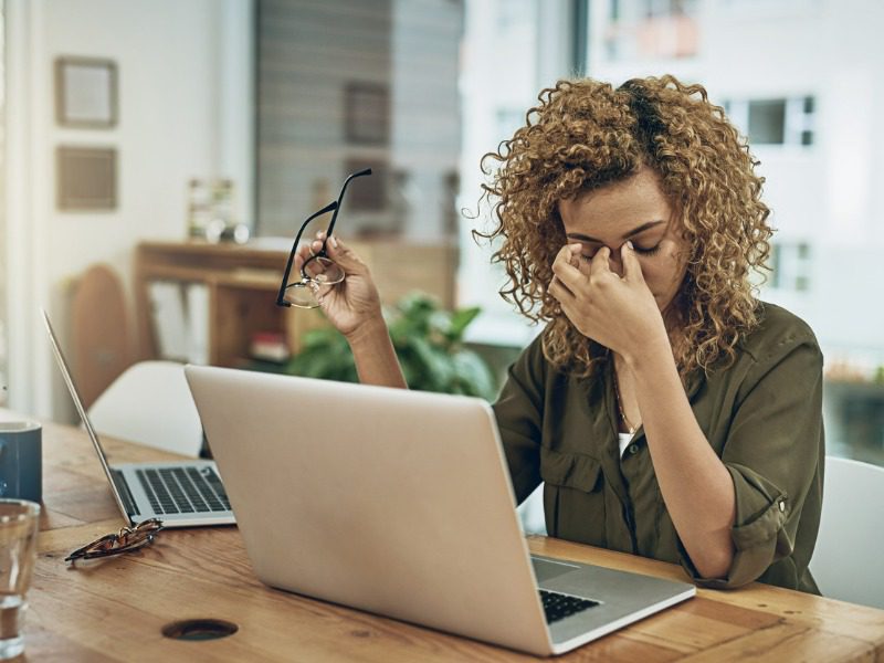 Stressed out person working from home.