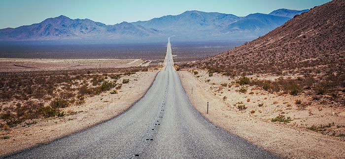 Image of a long road in the desert for the Quotacy blog: How Long Your Term Life Insurance Can Last Just Got Longer.