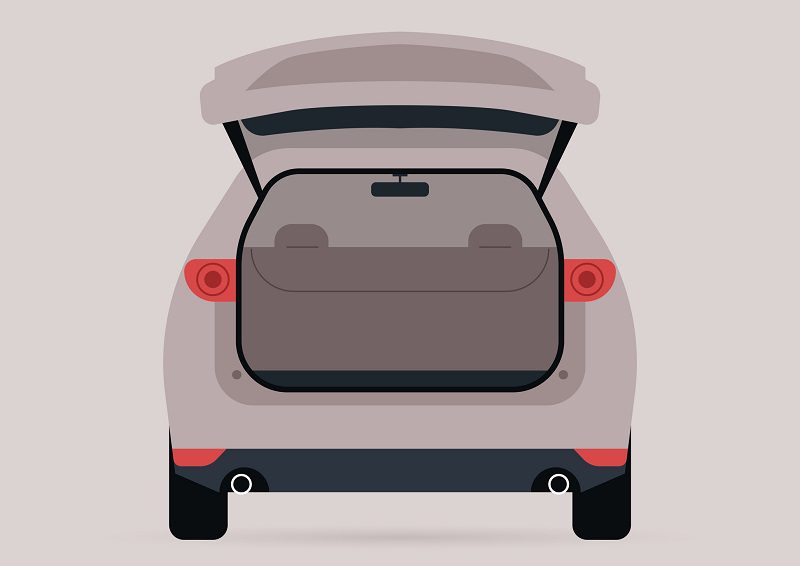 A wide open trunk of an empty SUV car,