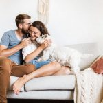 couple embracing on the couch