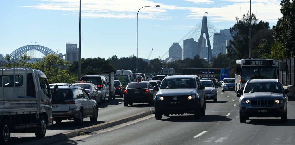 Who's holding back electric cars in Australia? We've long known the answer – and it's time to clear the road