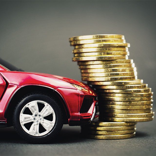 A car hitting a pile of coins