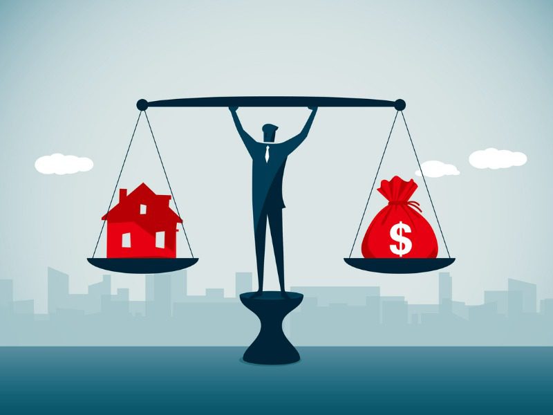 Illustration of a businessman holding a scale above his head with a house on one side and a bag of money on the other side