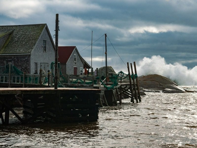 sea coast houses bracing for a hurricane