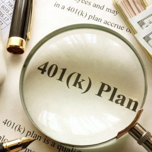 Magnifying glass over the phrase 401(k) Plan