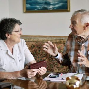 Older couple talking about money