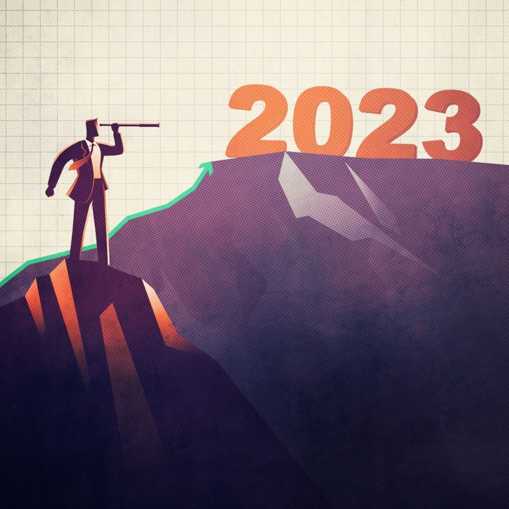 Man with telescope looking at 2023