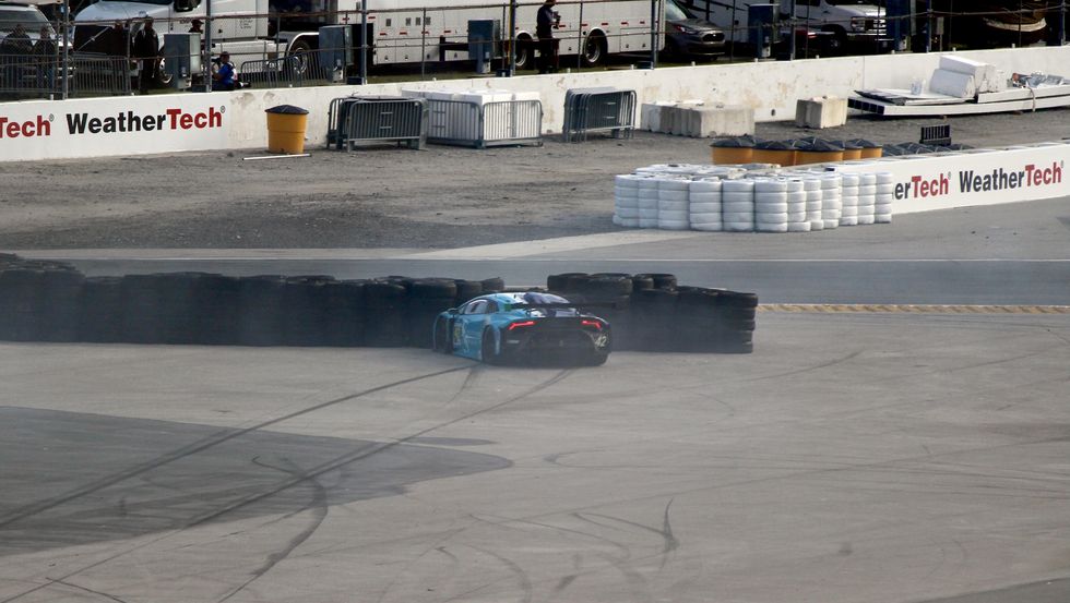 A Lamborghini Huracan GTD car in a tire barrier a lamborghini huracan gtd car in a tire barrier