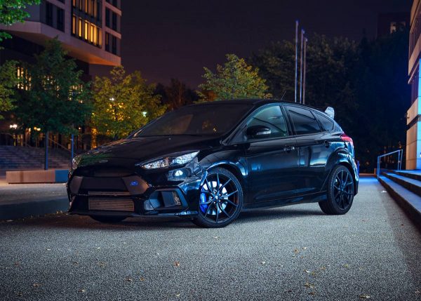 Modified Ford Fiesta parked during the night