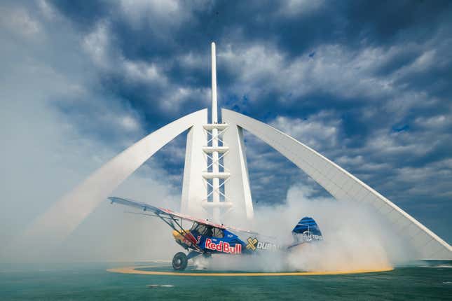 Image for article titled Stunt Pilot Lands on the World's Shortest Runway, a Helipad