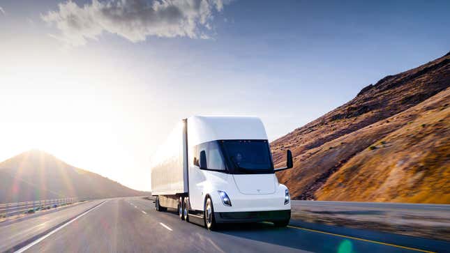 A render of the Tesla Semi electric truck driving on a highway.