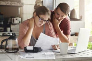 Couple applying for medical mortgage loan programs