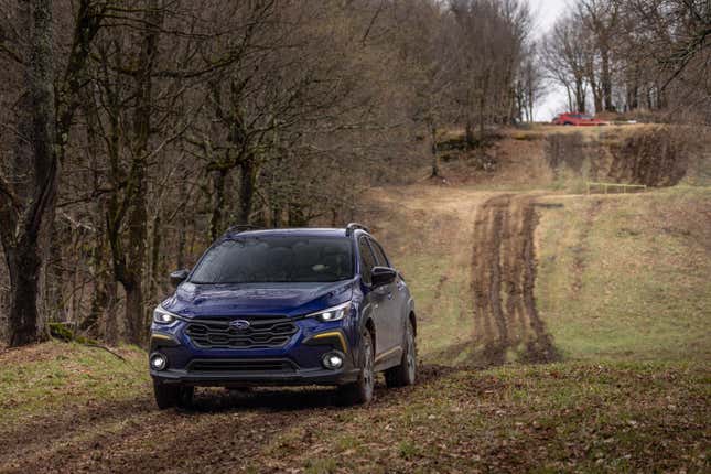 A blue 2024 Subaru Crosstrek Sport.