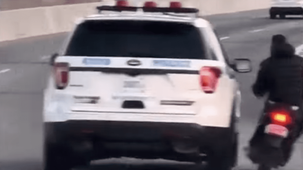 NYPD SUV Caught Swerving Towards Moped Rider On Expressway