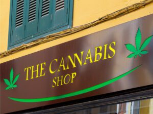 Sign on cannabis shop in a city