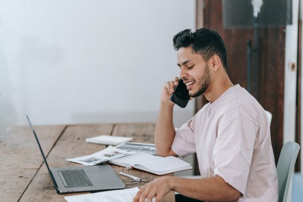 Person on the phone looking happy