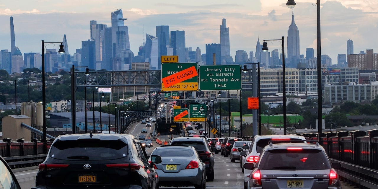 The Empire State Building and Tourist District are seen while Traffic jam is reported along the route to New York City on August 17, 2022, in Jersey City, New Jersey.