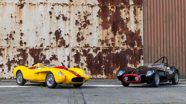 A photo of two Little Car Company Ferraris parked next to each other.