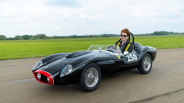 A photo of a Ferrari Testa Rossa J driving on track.