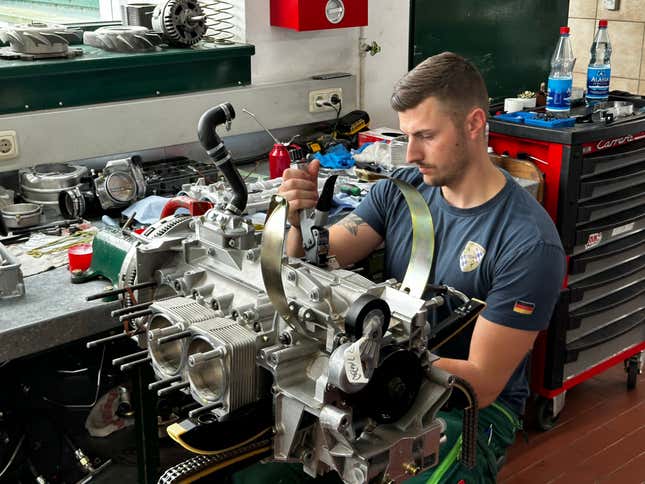 A man assembles a Ruf engine