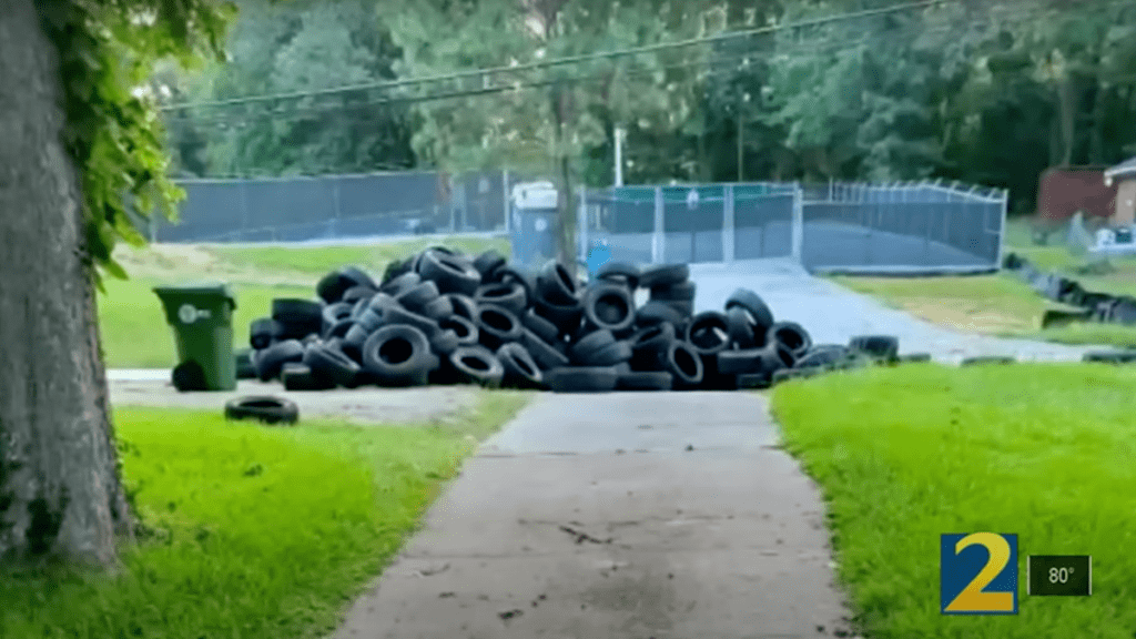 Some Dumbass Dumped A Pile Of Tires In A Cancer Patient's Driveway, Trapping Her At Home