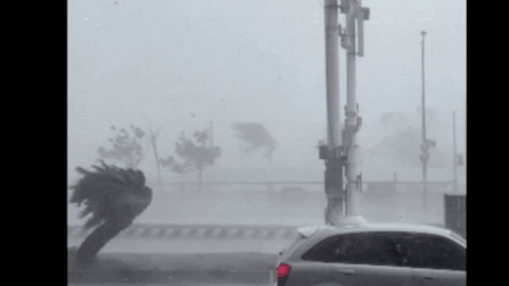 Watch A Typhoon Push A Car Backwards As It Drives Into The Wind