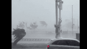 Watch A Typhoon Push A Car Backwards As It Drives Into The Wind