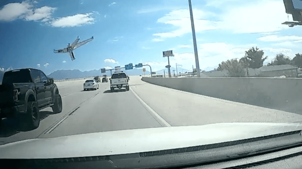 Watch a whirling office chair smash into car's windshield on Utah interstate