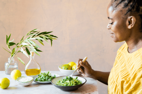 Woman Eating Pasta Meal, Healthy Meal With Lots Of Greens