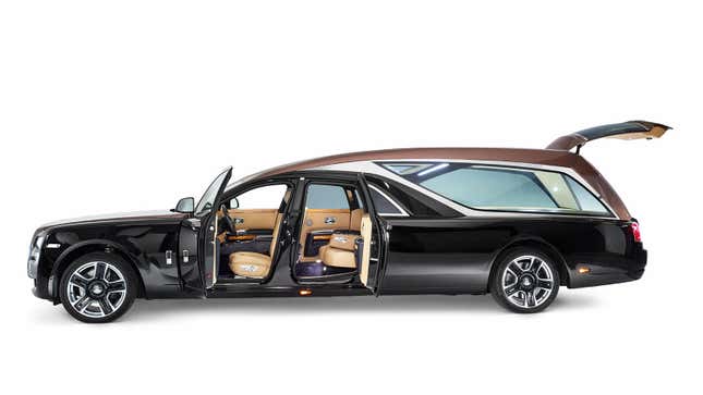A photo of the Rolls Royce hearse with its doors open.