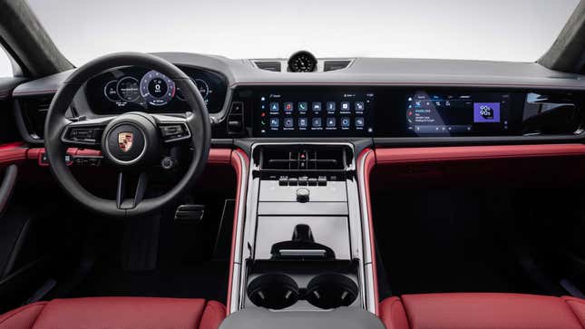 Dashboard view of a red and black 2024 Porsche Panamera interior