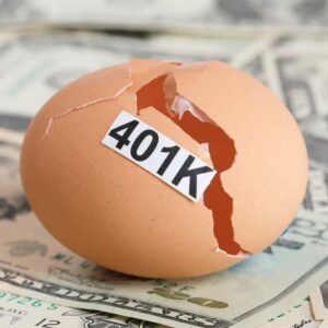 cracked 401k egg on top of money