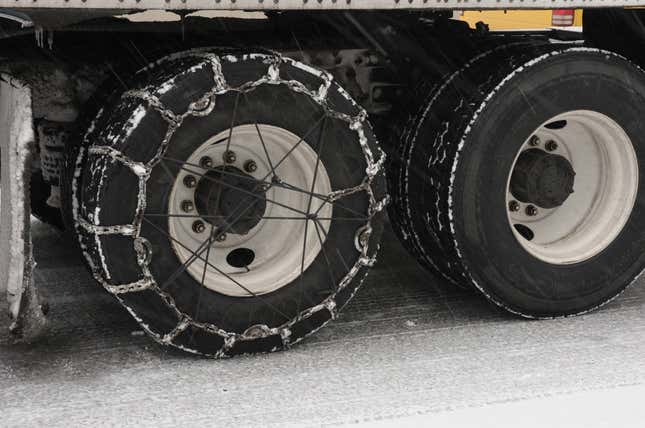 Image for article titled That Semi Truck Passing You This Winter Isn&#39;t Running Snow Tires