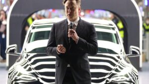 Elon Musk warns Tesla workers they'll be sleeping on the production line to build its new mass-market EV