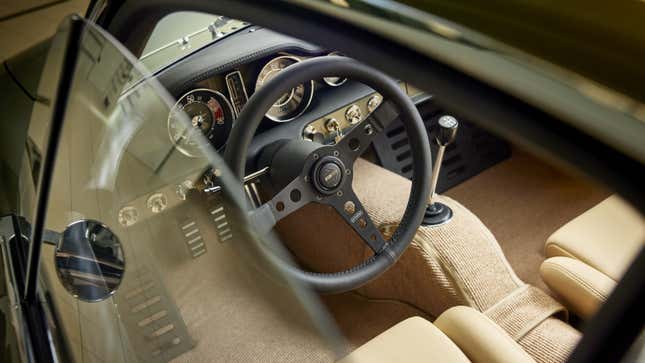 A photo of the interior of the Volvo P1800 Cyan