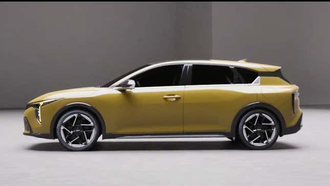 A side view of the yellow Kia K4 Hatchback