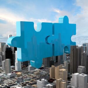 Buildings with a puzzle pieces on top of them