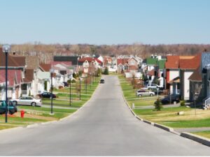 Two rows of suburban residences facing each other with a road running between them