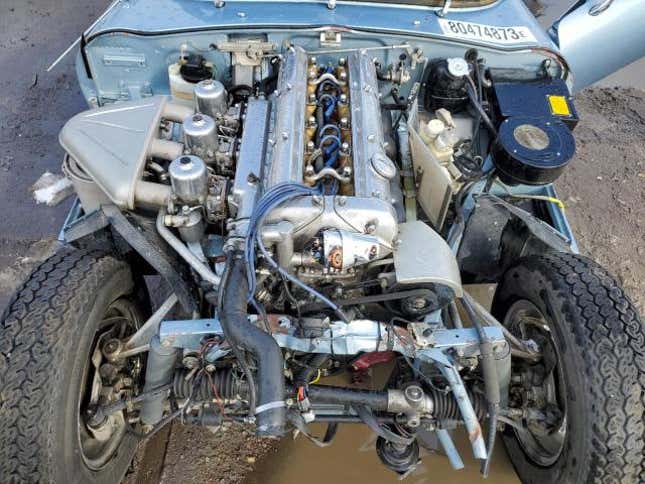 Image for article titled This Wrecked Jaguar Series 1 E-Type Is Begging You To Turn It Into A Vintage Race Car