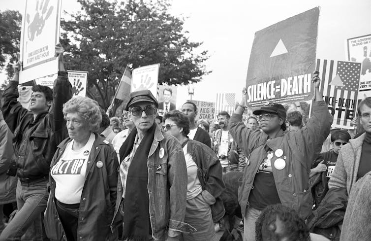 AIDS activists with signs protest at FDA headquarters
