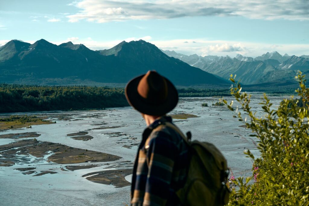 Hiker surveying mountains